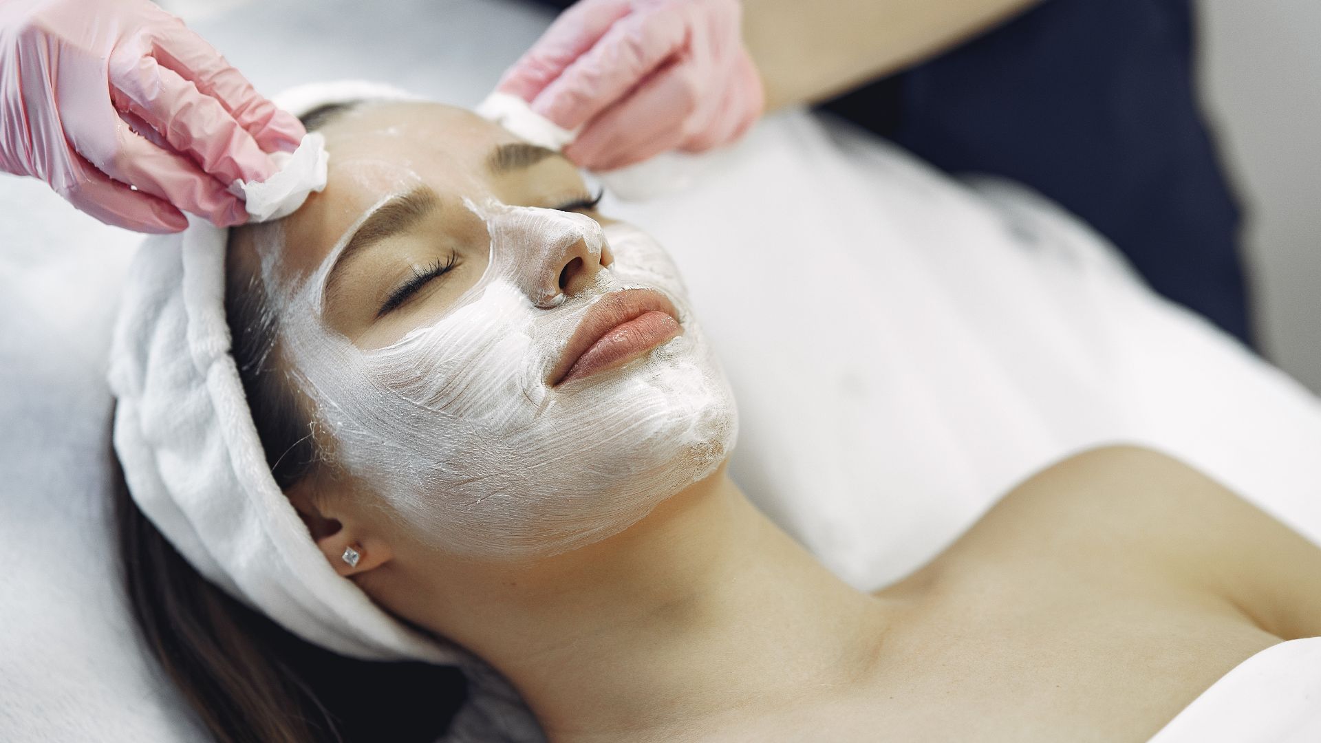 Medspa model receiving facial